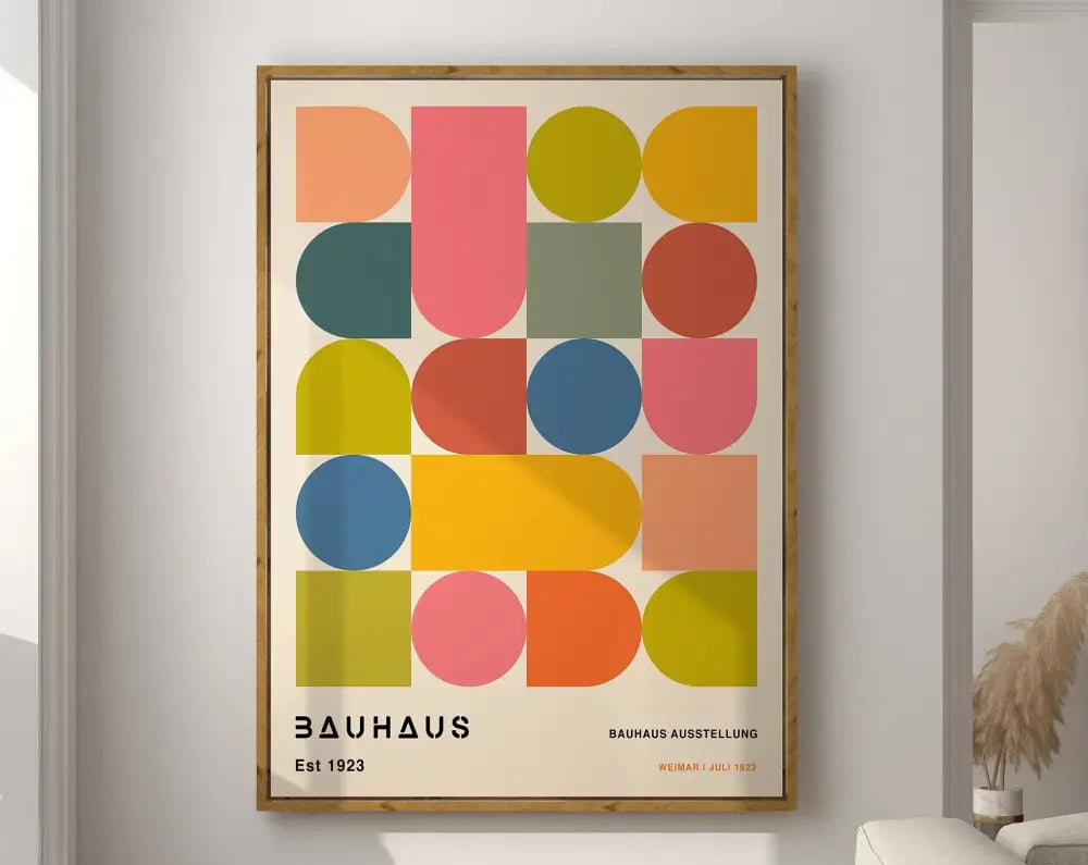 A framed decorbites™ geometric canvas poster with vibrant bauhaus style overlapping circles and rectangles in multiple colors
