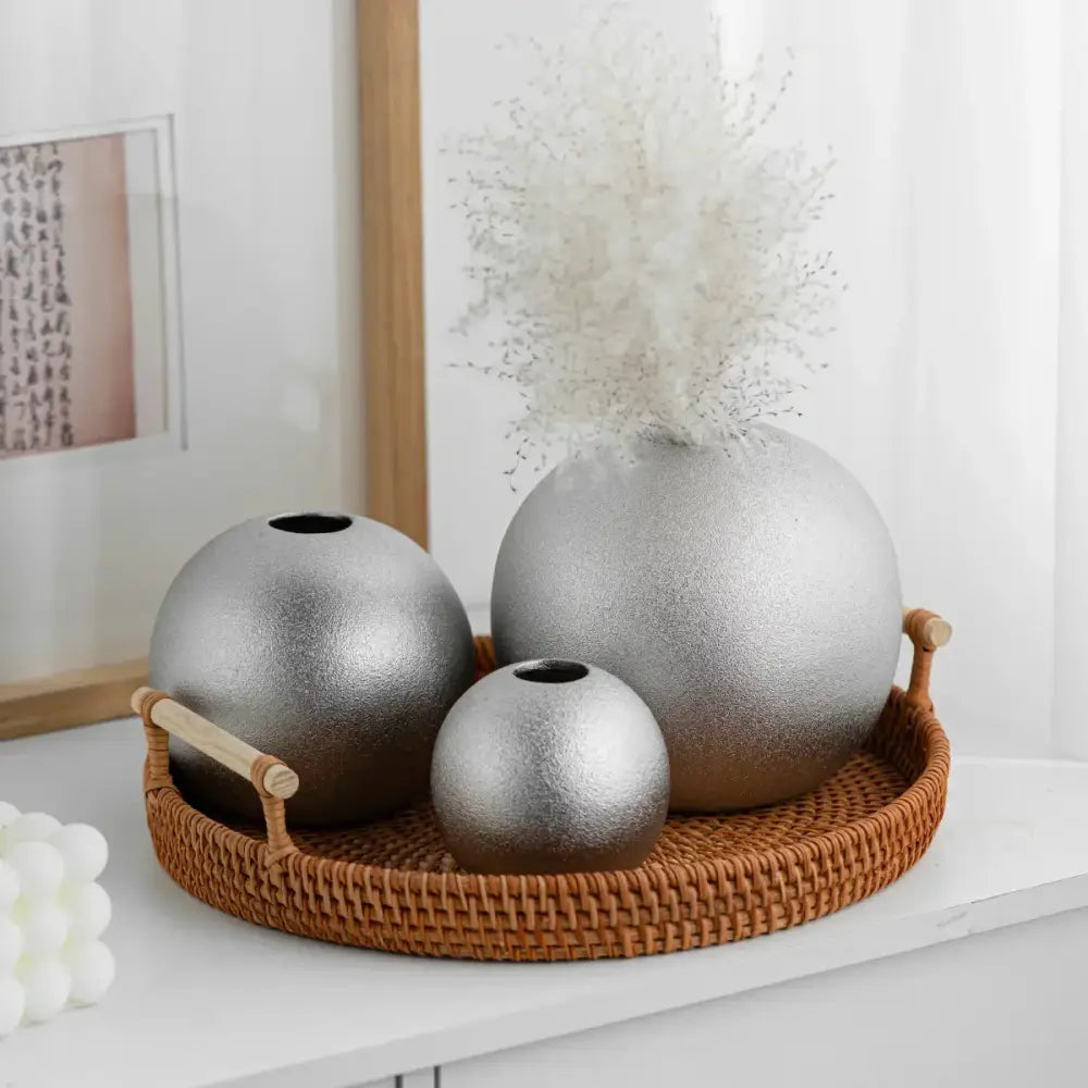 Set of three decorbites geometric gold and silver spherical ceramic vases with matte finish and small openings