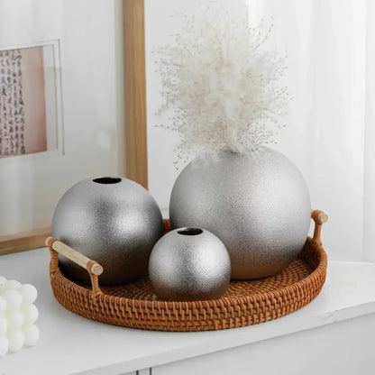 Set of three decorbites geometric gold and silver spherical ceramic vases with matte finish and small openings
