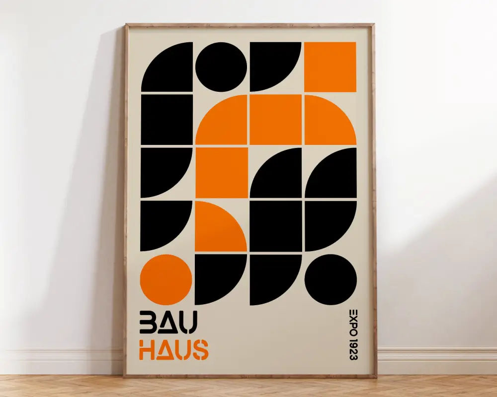 A framed DecorBites™ mid century canvas print featuring bold black and orange geometric wall art for home decor