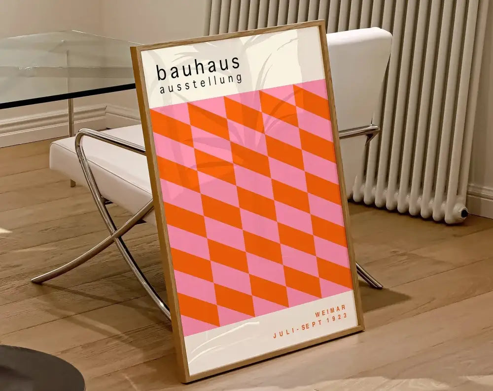 DecorBites™ geometric canvas poster with bold orange and pink diamond pattern in a light wood frame wall art