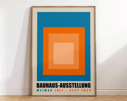Decorbites™ geometric mid-century canvas wall art print featuring blue orange and peach concentric squares with bold text
