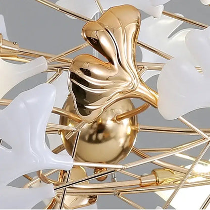 Gold-colored metallic ginkgo leaf chandelier with white translucent petals by decorbites for living dining bedroom use