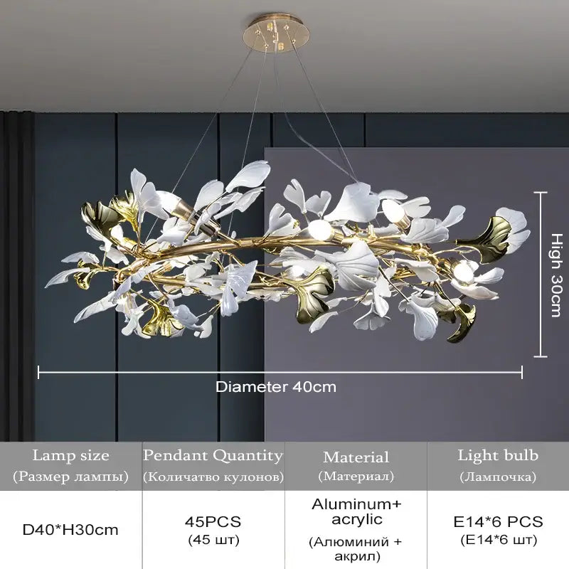 DecorBites ginkgo leaf crystal chandelier featuring white and gold aluminum leaf elements suspended from brass fixture