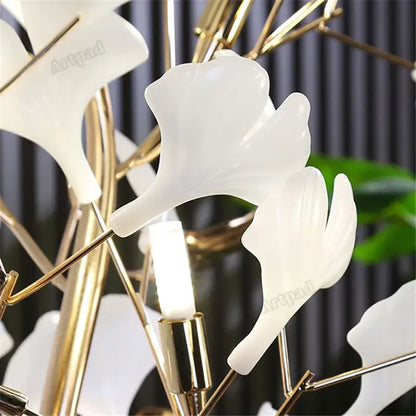 White translucent ginkgo leaf floor lamp with gold toned metal frame by decorbites for living room and bedroom use