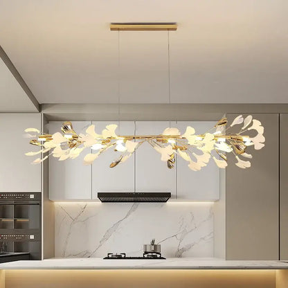 Gold-toned ginkgo leaf pendant chandelier with translucent white petals by decorbites for Nordic romantic decor