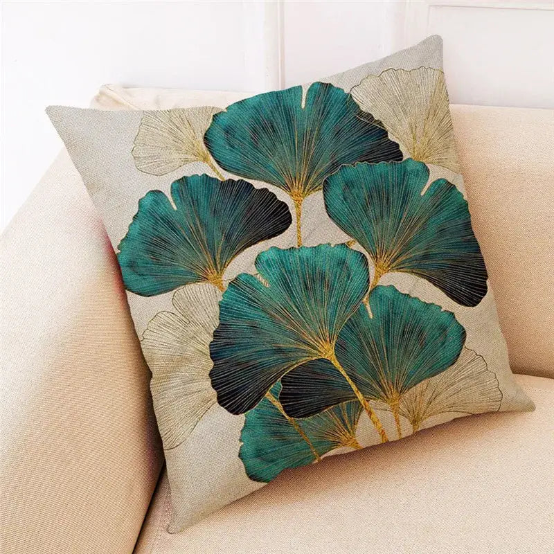 Beige linen cushion cover with vibrant teal and gold ginkgo leaves pattern by decorbites ginkgo leaves for modern decor
