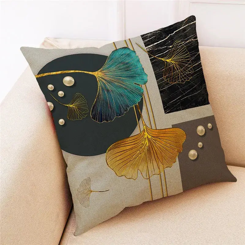 A decorbites ginkgo leaves cushion cover with teal and gold linen ginkgo leaves on beige for modern home decor