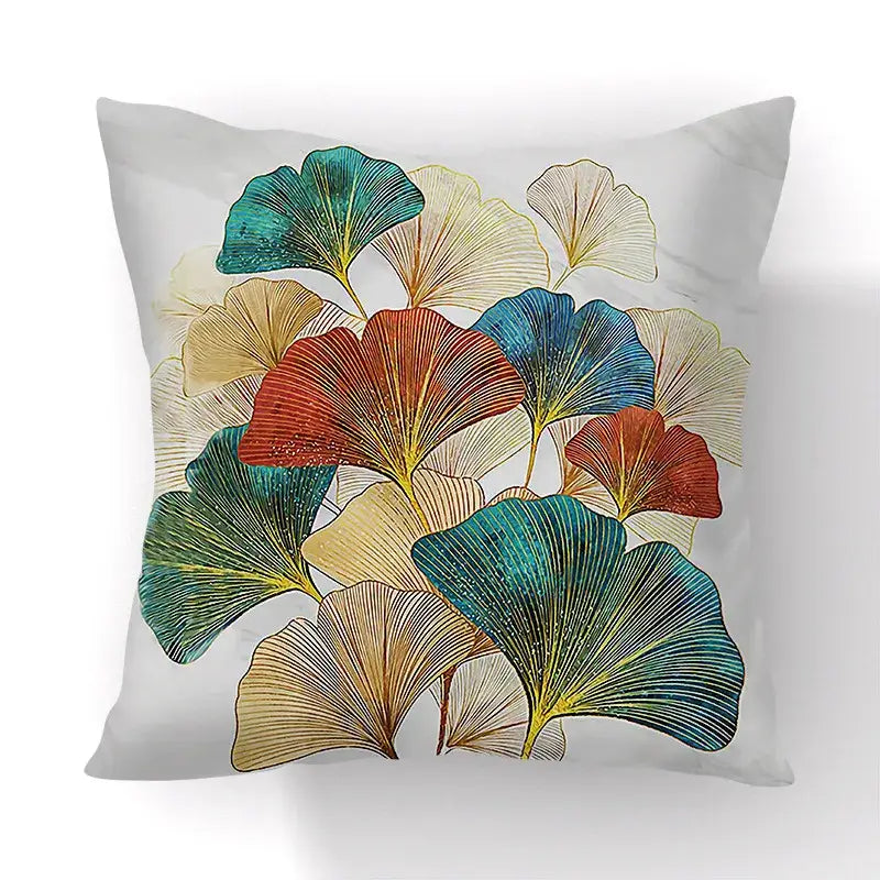 Square throw pillow with decorbites ginkgo leaves print in teal red gold on light gray for sofa or chair cover