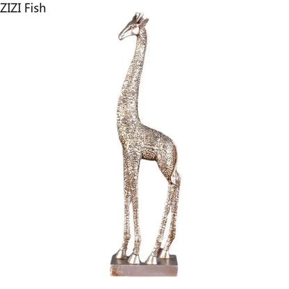 Silver-toned giraffe resin statue with intricate floral embossing and polished finish on rectangular base for decor