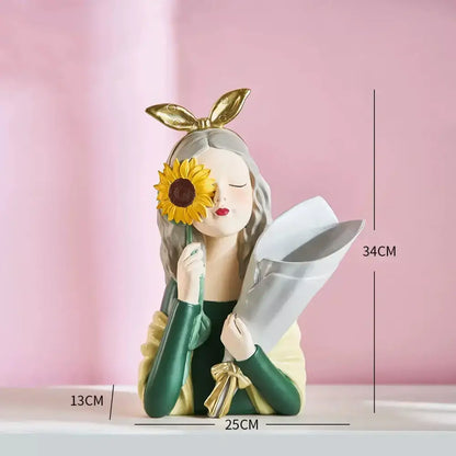 A decorbites girl statues resin figurine with silver hair gold bunny ears holding a sunflower and wrapped bouquet for vase ornaments