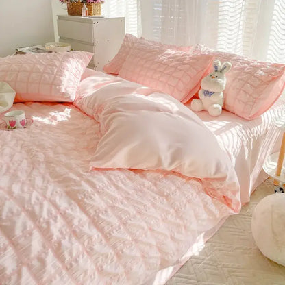 Pink quilted bedding set with satin finish and geometric stitching from decorbites girls bubble gauze comforter kit