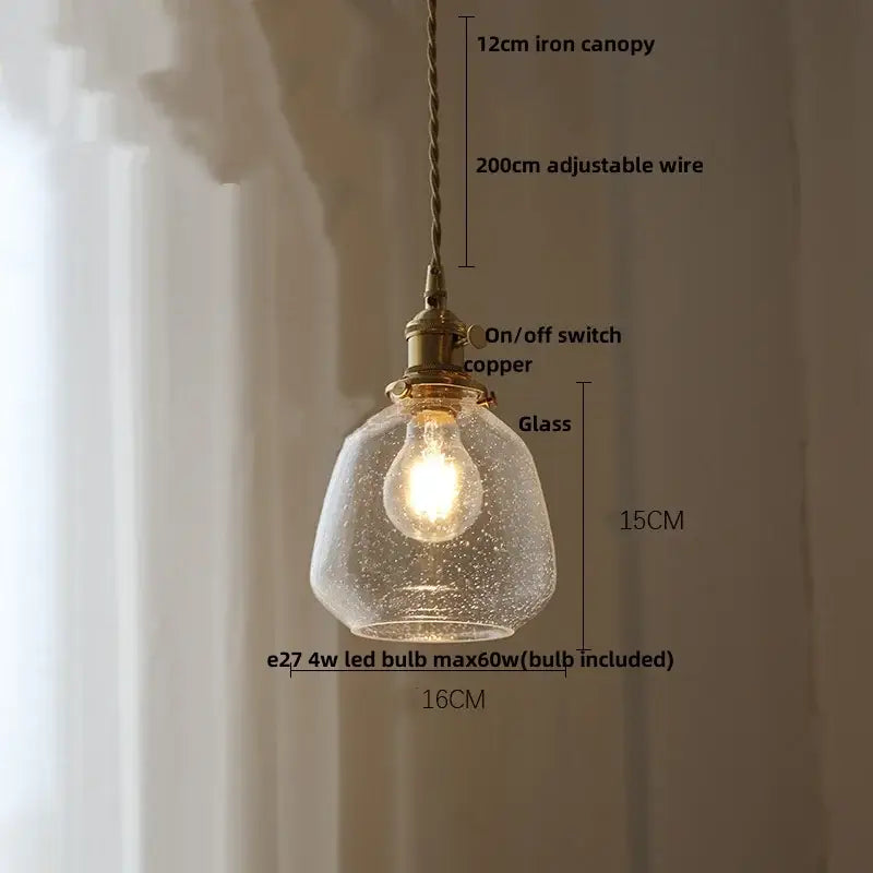 Decorbites glabe glass led pendant light fixture with warm-glowing textured glass and brass-toned copper hardware