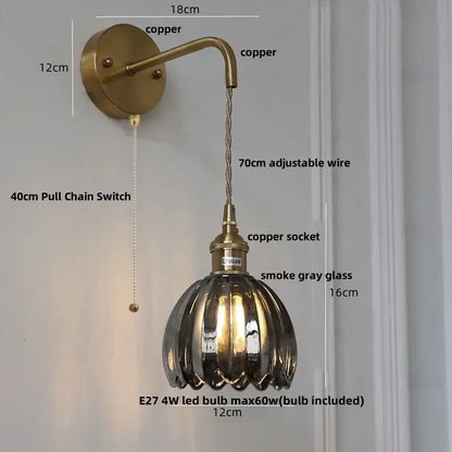 Antique brass-finished decorbites glass adjustable wall lamp with fluted smoke gray glass shade and copper wire