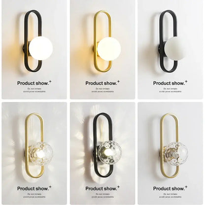 Modern minimalist decorbites glass aisle wall lamp with sleek curved metal frame and illuminated spherical glass globe