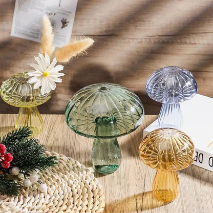 DecorBites™ glass aromatherapy vase set features four colorful ribbed glass vases for home decor with one holding a daisy