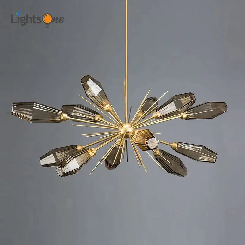 Gold-toned decorbites glass art chandelier with faceted smoked glass prisms and central crystal for living room use