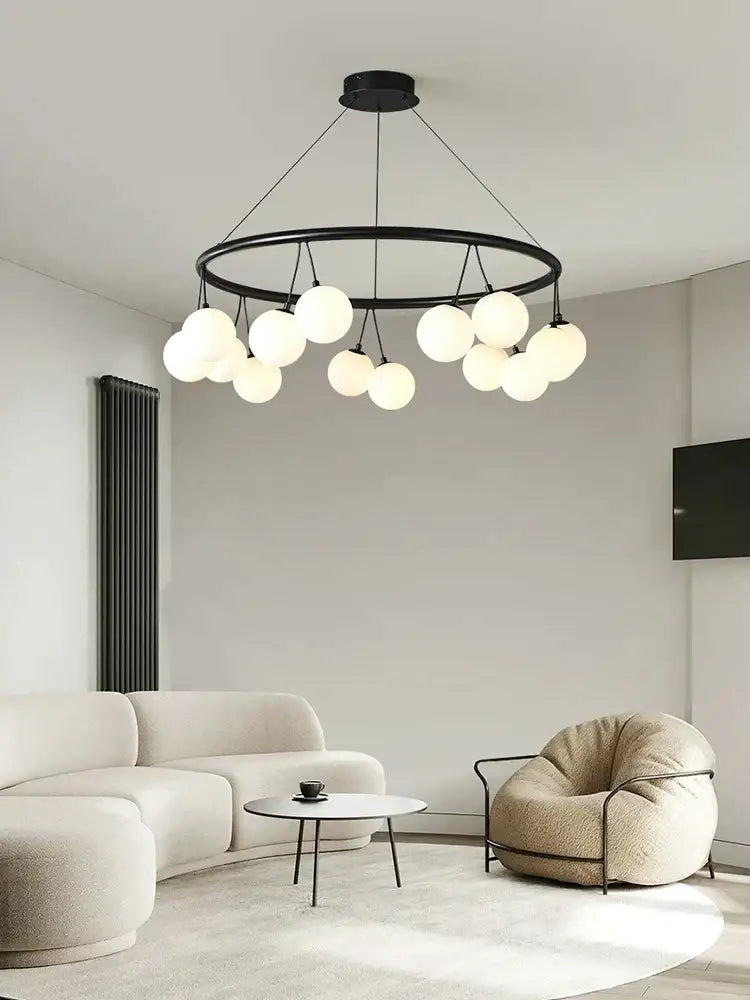 Black circular decorbites glass art chandelier with multiple frosted glass globe lights for living and dining rooms