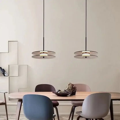 DecorBites glass art chandelier with sleek black cords and layered glass shades emitting warm LED light for modern spaces