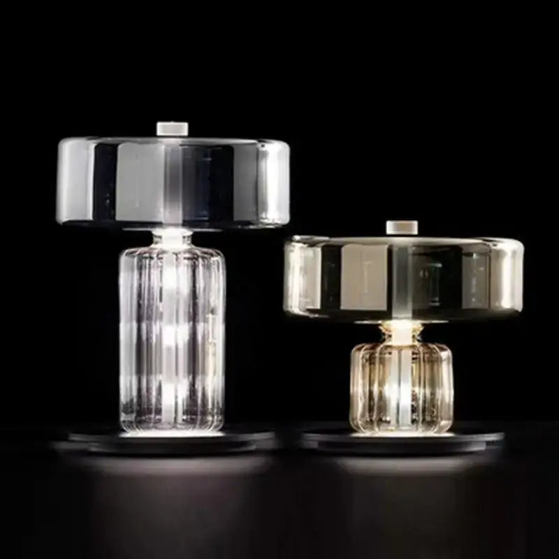 Two decorbites glass art desk lamps with clear vertically ribbed glass bases and chrome tops for bedroom and living room