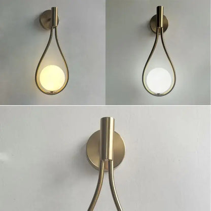 Brass teardrop-shaped decorbites glass ball wall lamp with curved metal frame and frosted glass diffuser for bedroom lighting