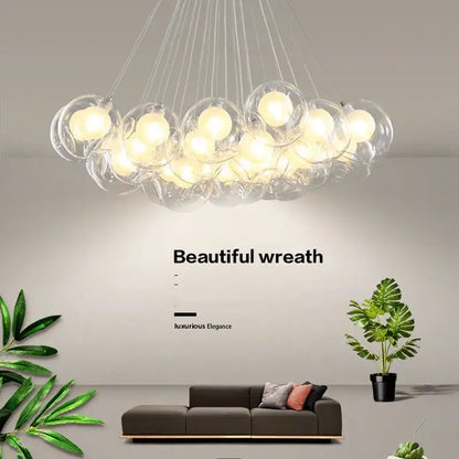 Modern glass ball bubble chandelier with warm glowing bulbs suspended by thin cords for DecorBites glass ball lighting