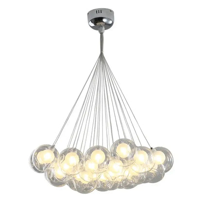 Modern chrome DecorBites bubble chandelier with clear glass spheres and warm bulbs for living room and dining table lighting