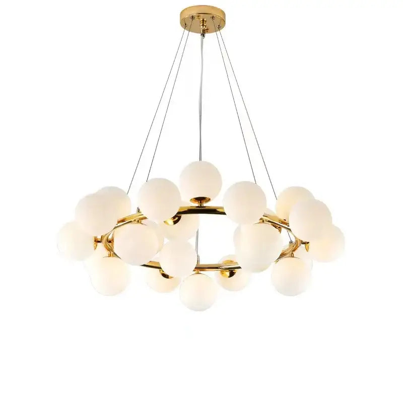 Gold-toned decorbites glass ball ceiling chandelier with frosted glass globe bulbs in modern circular design for living rooms