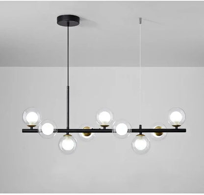 Black metal DecorBites™ ball ceiling chandelier with clear glass ball bulbs and gold-toned accents for home lighting