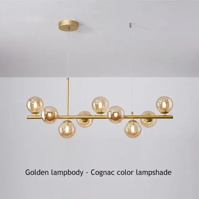Golden decorbites™ glass ball ceiling chandelier with polished brass frame and cognac-colored spherical glass lampshades