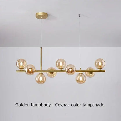 Golden decorbites™ glass ball ceiling chandelier with polished brass frame and cognac-colored spherical glass lampshades
