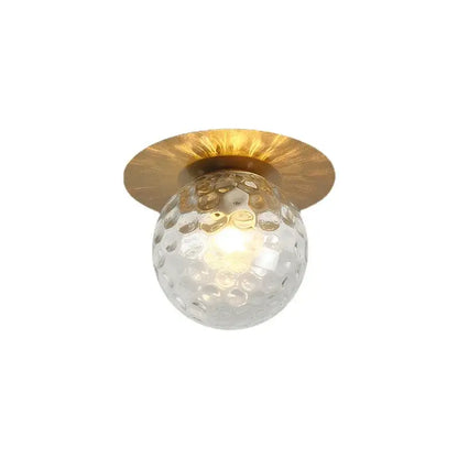 DecorBites glass ball ceiling light with clear textured glass globe and hammered gold-toned metal base for bedroom