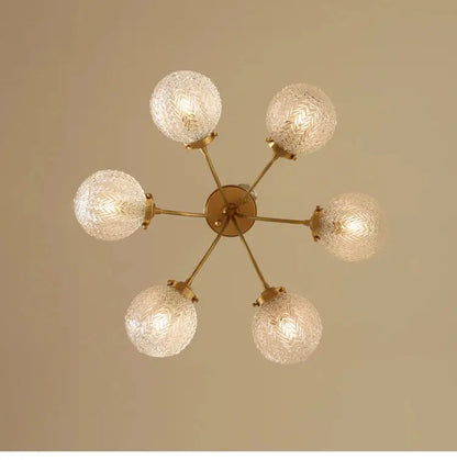 Gold-toned decorbites glass ball ceiling light with six clear textured glass globe shades for modern living rooms