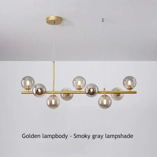 Golden decorbites™ glass ball chandelier with smoky gray glass globes and polished brass frame for living rooms and dining rooms