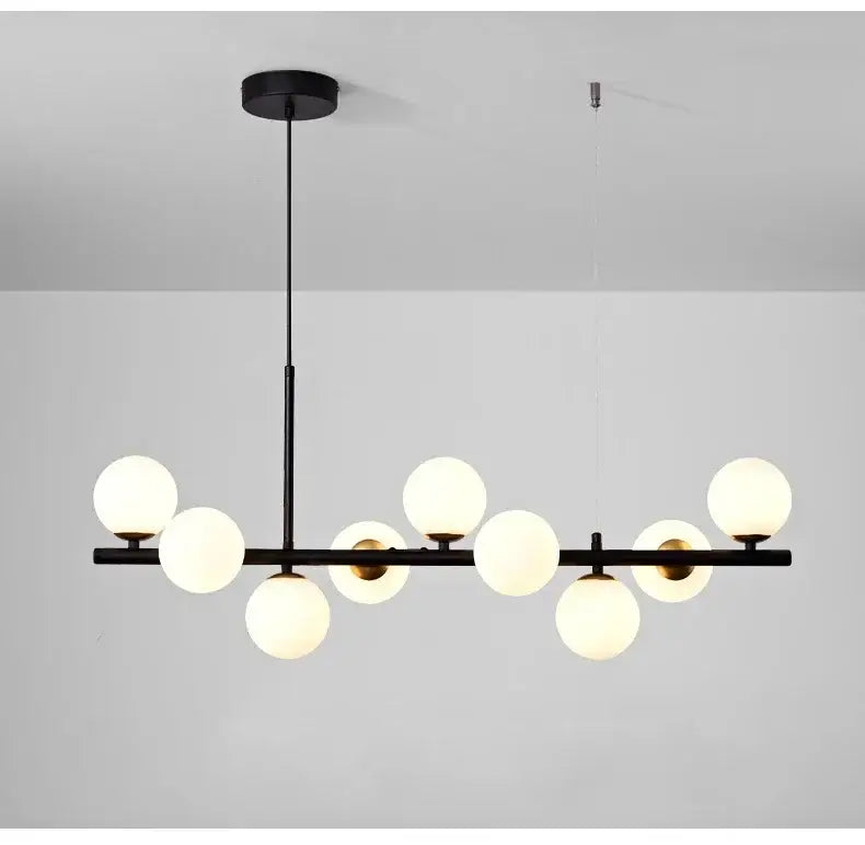 Black DecorBites™ glass ball chandelier with nine frosted glass globe lights for dining room lighting