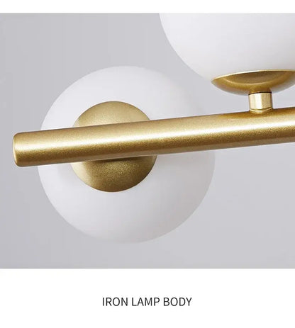 DecorBites™ glass ball chandelier with gold-finished iron body and frosted white spherical glass ball shades for home lighting