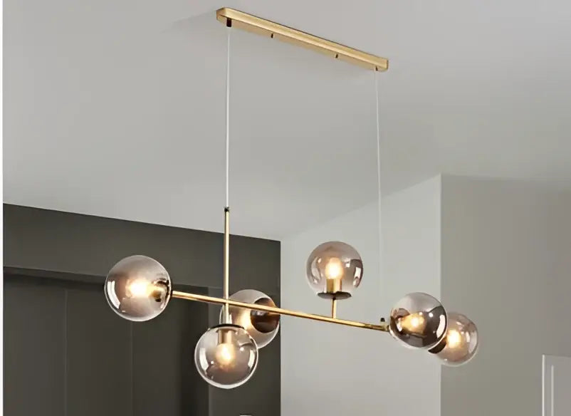 Gold-toned decorbites glass ball chandelier with six spherical glass globes for modern kitchen bar and loft lighting