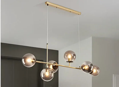 Gold-toned decorbites glass ball chandelier with six spherical glass globes for modern kitchen bar and loft lighting