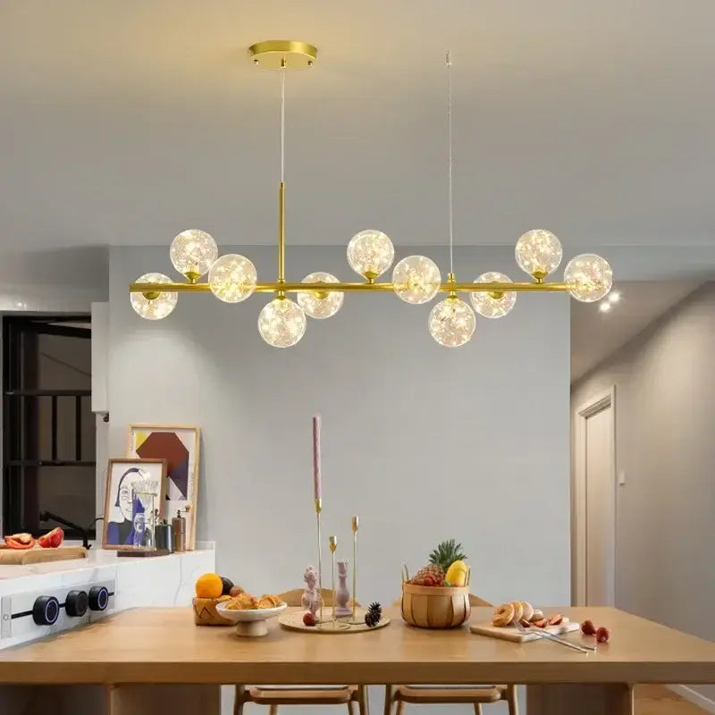 Gold-toned DecorBites™ glass ball chandelier with multiple frosted glass globe bulbs modern lighting fixture