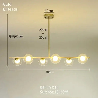 Gold-finished DecorBites glass ball chandelier with six spherical glass globes in a modern LED pendant lamp design