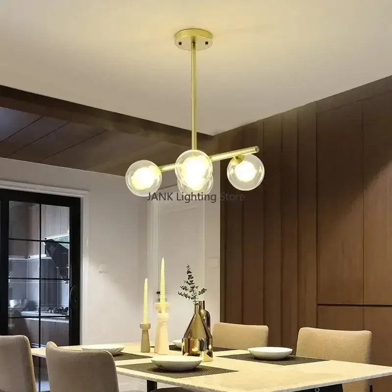 Gold-toned decorbites glass ball chandelier with three spherical glass bulbs modern LED pendant lamp for home decor