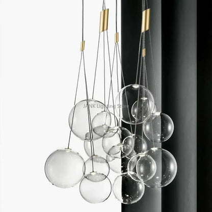 DecorBites glass ball chandelier with gold-toned metal accents and clear glass spheres for modern home decor
