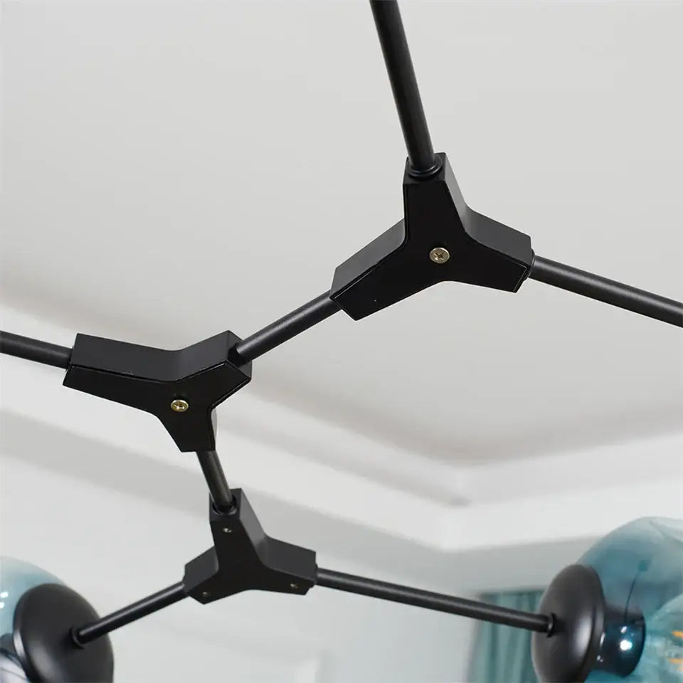Black metal decorbites™ glass ball led chandelier with teal glass ball fixtures and geometric tripod connectors nordic style
