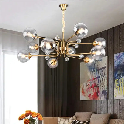 Gold-toned decorbites glass bubble chandelier with clear glass globe shades and crystal accents for living room lighting