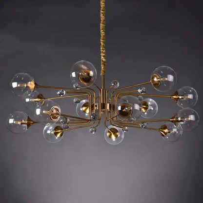 Gold-toned decorbites glass bubble chandelier with clear glass globe bulbs and crystal accents for living room lighting