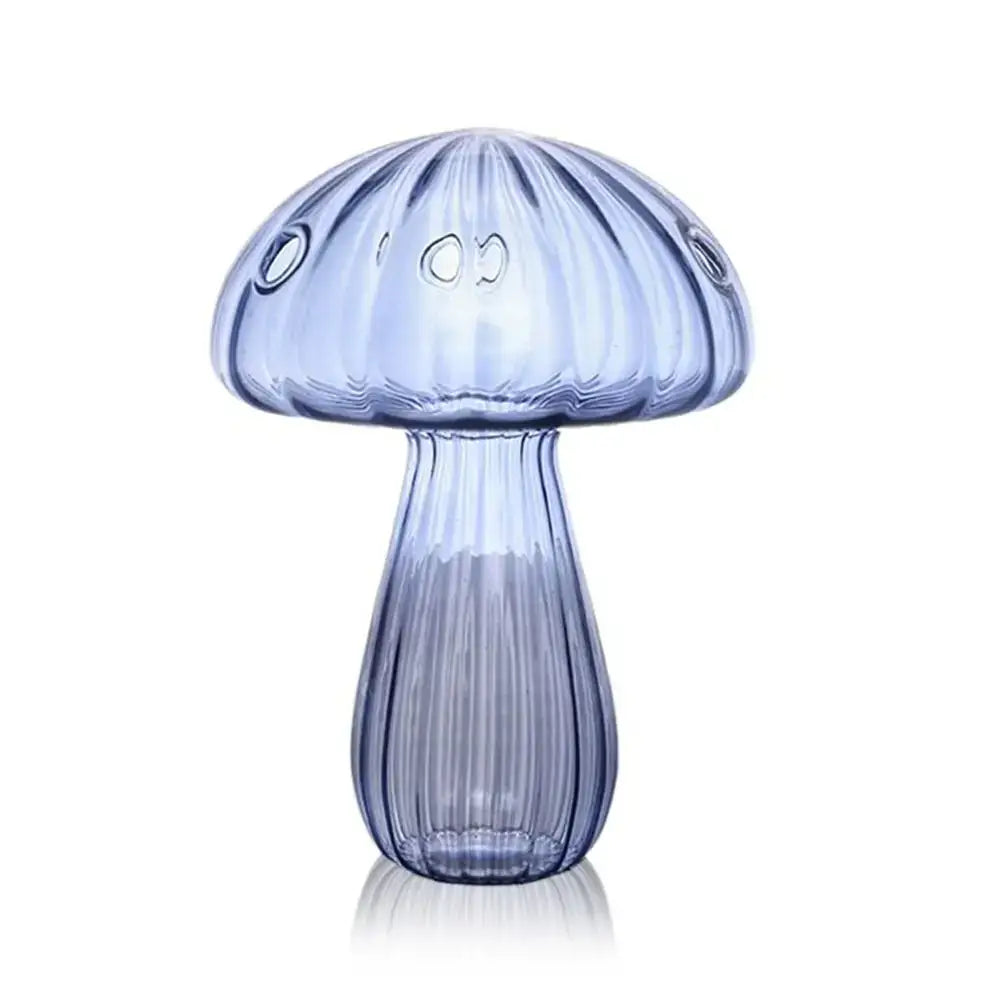 DecorBites™ translucent blue glass mushroom shaped vase with vertical ridges and three circular cutouts on cap