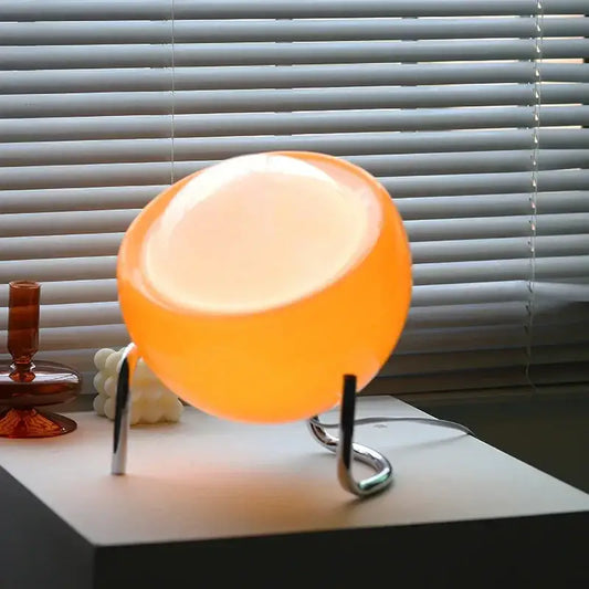 Decorbites™ glass table lamp with orange translucent spherical shade and sleek chrome stand for stylish decor