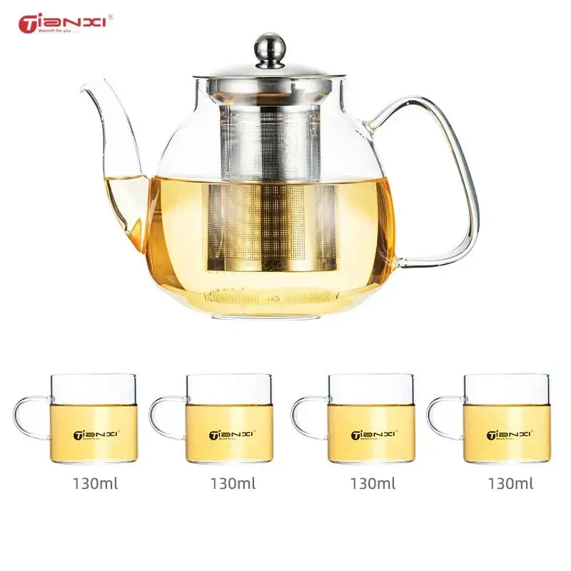 Clear glass tea pot with stainless steel infuser and lid with four matching 130ml glass tea cups for steeping beverages