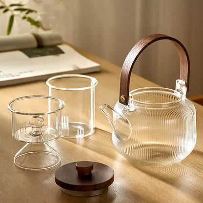 Clear glass decorbites glass tea pot with wooden handle lid and vertical ribbed texture for steaming tea set