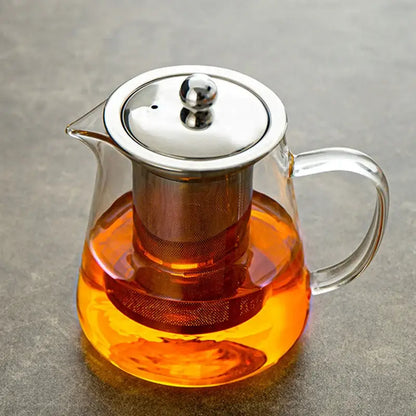 Decorbites glass teapot with stainless steel lid and built-in filter holding orange tea for puer tea and coffee use
